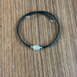 Elegant Black and Silver Bracelet with Adjustable Design